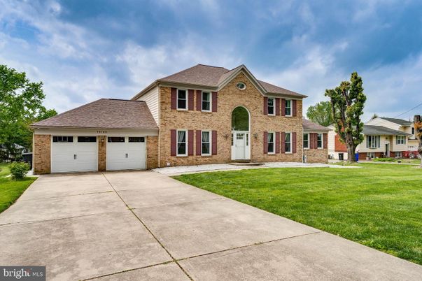 Attached, Exterior, Facade, Brick Facade, French Provincial