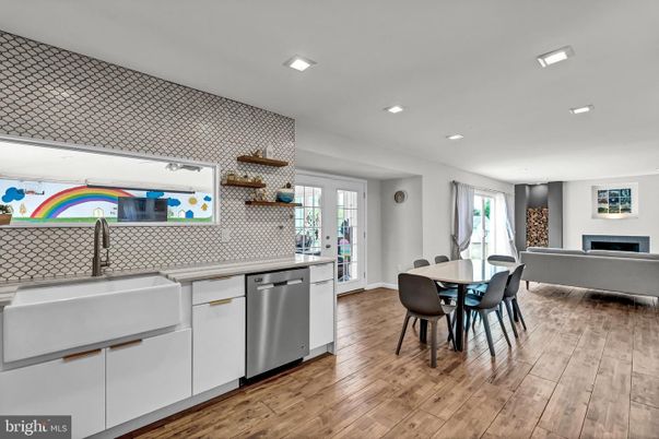 Dining room, Fireplace, Interior, Kitchen, Recessed Lighting, Wood Texture Flooring