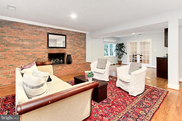 Fireplace, Interior, Living room, Recessed Lighting, Stone Walls, Wood Texture Flooring