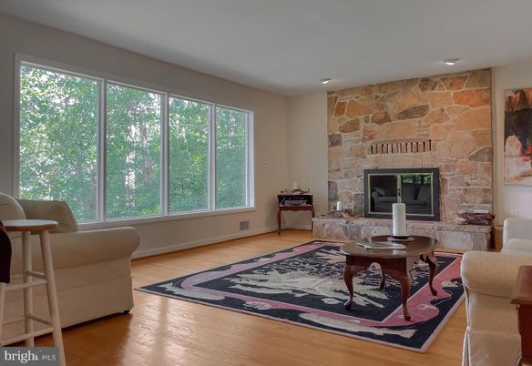 Fireplace, Interior, Recessed Lighting, Stone Walls, Wood Texture Flooring