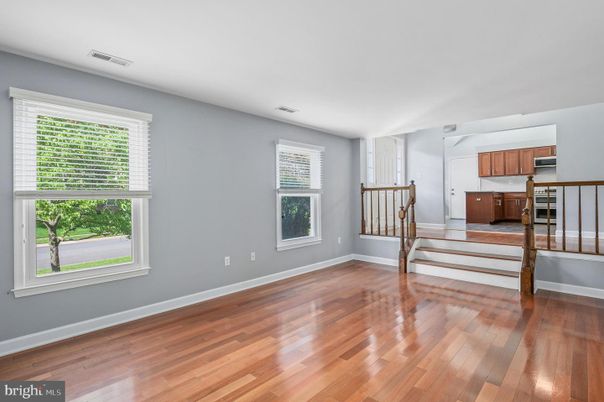 Empty room, Interior, Kitchen, Stainless Steel Appliances, Wood Texture Flooring