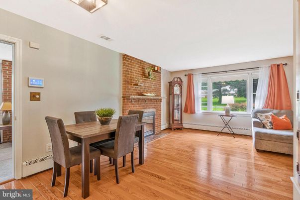 Dining room, Fireplace, Interior, Stone Walls, Wood Texture Flooring