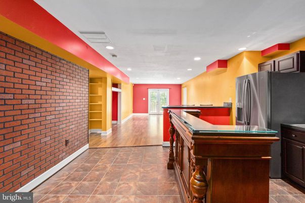 Interior, Kitchen, Recessed Lighting, Stone Walls, Wood Texture Flooring