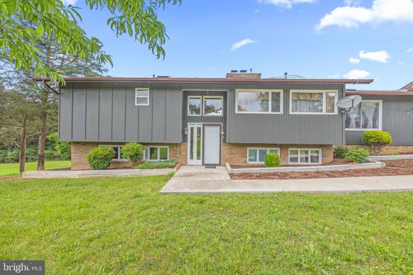 Exterior, Facade, Brick Facade, Raised Ranch