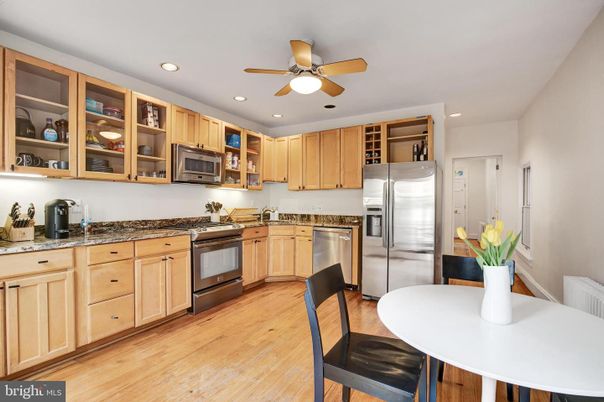 Dining room, Interior, Kitchen, Recessed Lighting, Stainless Steel Appliances, Wood Texture Flooring