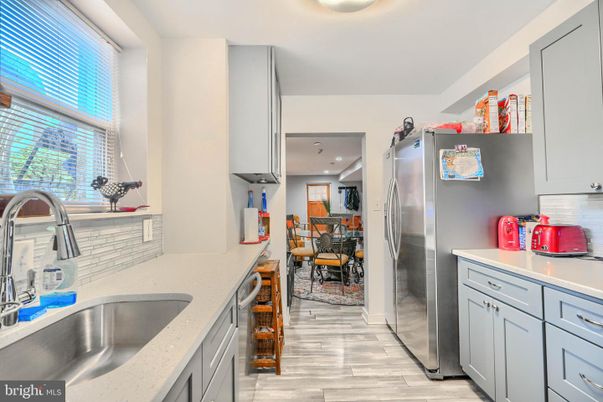 Dining room, Interior, Kitchen, Recessed Lighting, Stainless Steel Appliances, Wood Texture Flooring