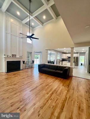 Fireplace, Interior, Kitchen, Living room, Recessed Lighting, Stainless Steel Appliances, Wood Texture Flooring