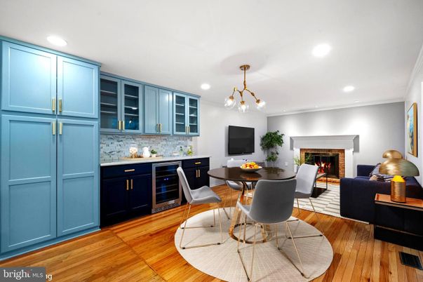 Dining room, Fireplace, Interior, Living room, Pendant Lights, Recessed Lighting, Wood Texture Flooring