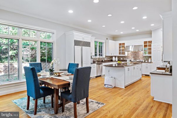 Dining room, Interior, Kitchen, Recessed Lighting, Stainless Steel Appliances, Wood Texture Flooring