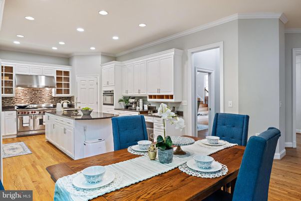 Dining room, Interior, Kitchen, Recessed Lighting, Stainless Steel Appliances, Wood Texture Flooring