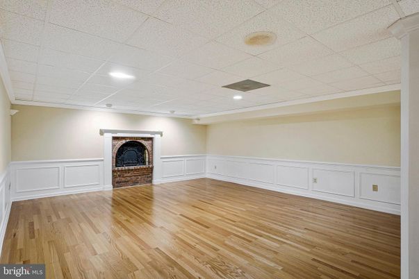 Empty room, Fireplace, Interior, Recessed Lighting, Wood Texture Flooring