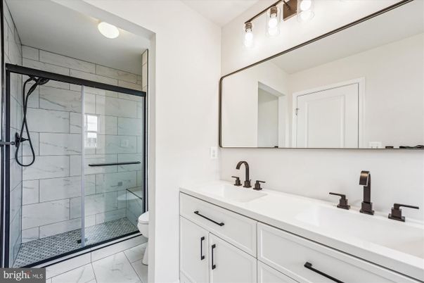 Bathroom, Dual Sink Vanities, Glass Shower, Interior, Marble, Marble Walls