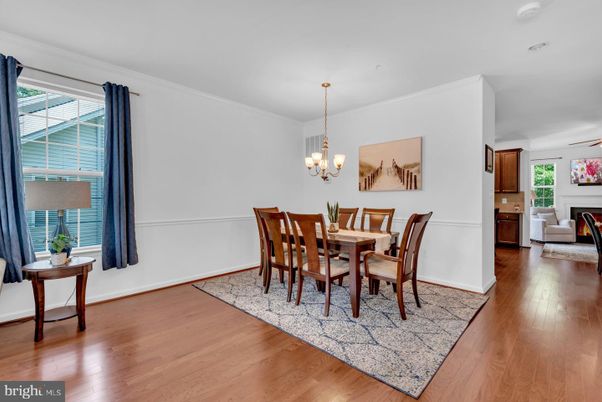 Chandelier, Dining room, Fireplace, Interior, Wood Texture Flooring