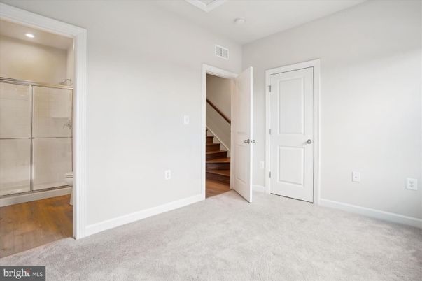Bathroom, Empty room, Glass Shower, Interior, Recessed Lighting, Wood Texture Flooring