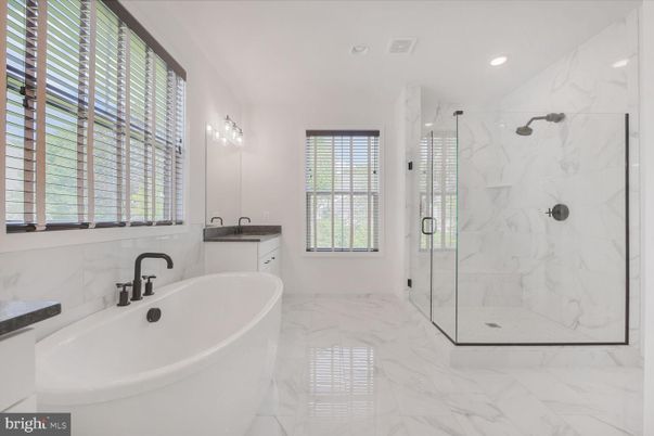 Bathroom, Free Standing Baths, Glass Shower, Interior, Marble, Marble Walls, Recessed Lighting