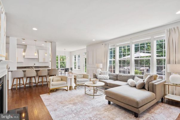 Dining room, Fireplace, Interior, Living room, Pendant Lights, Recessed Lighting, Wood Texture Flooring