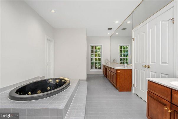 Bathroom, Dual Sink Vanities, Interior, Recessed Lighting, Tile Countertops