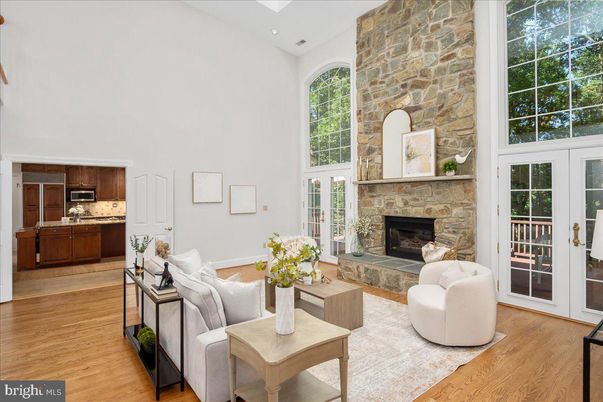 Fireplace, Interior, Kitchen, Living room, Recessed Lighting, Stone Walls, Wood Texture Flooring