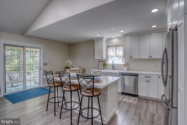 Dining room, Interior, Kitchen, Recessed Lighting, Stainless Steel Appliances, Wood Texture Flooring