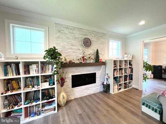 Fireplace, Interior, Recessed Lighting, Stone Walls, Wood Texture Flooring