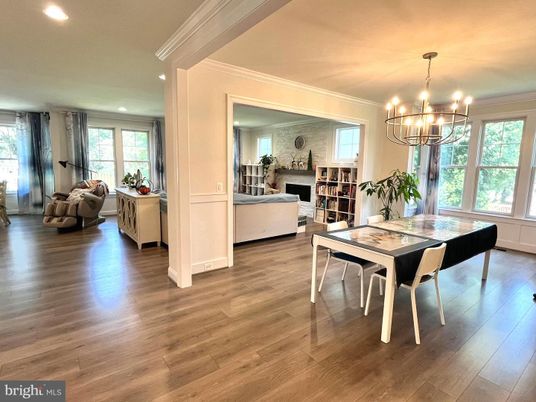 Chandelier, Dining room, Fireplace, Interior, Living room, Recessed Lighting, Wood Texture Flooring