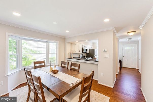 Dining room, Interior, Kitchen, Recessed Lighting, Stainless Steel Appliances, Wood Texture Flooring