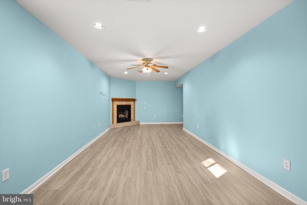 Empty room, Fireplace, Interior, Recessed Lighting, Wood Texture Flooring