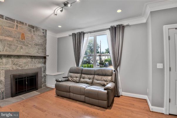 Fireplace, Interior, Recessed Lighting, Stone Walls, Wood Texture Flooring