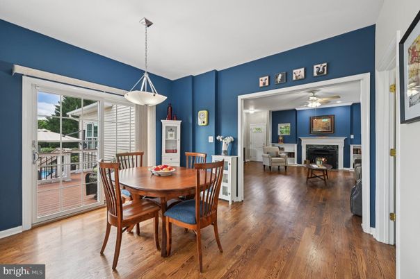 Dining room, Fireplace, Interior, Pendant Lights, Wood Texture Flooring