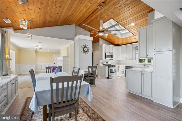 Dining room, Interior, Kitchen, Pendant Lights, Recessed Lighting, Stainless Steel Appliances, Wooden Ceilings, Wood Texture Flooring