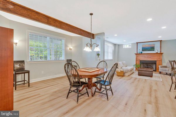 Dining room, Fireplace, Interior, Living room, Pendant Lights, Recessed Lighting, Wood Texture Flooring