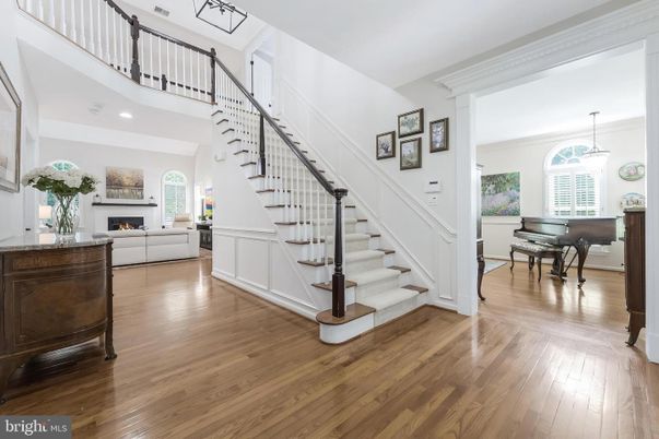 Fireplace, Interior, Pendant Lights, Piano, Recessed Lighting, Wood Texture Flooring
