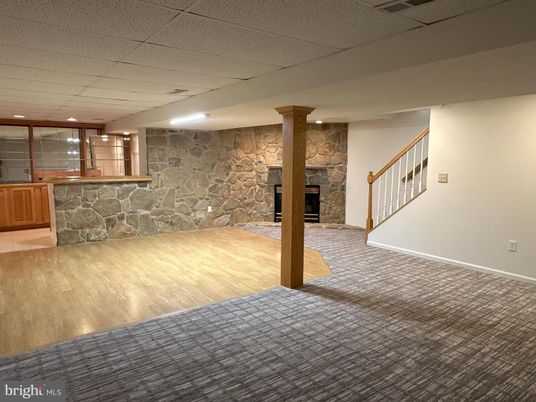 Fireplace, Interior, Recessed Lighting, Stone Walls, Wood Texture Flooring