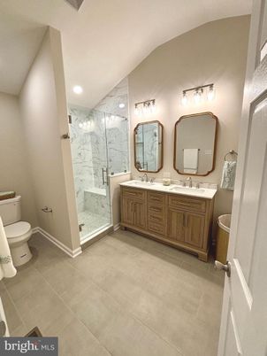 Bathroom, Dual Sink Vanities, Glass Shower, Interior, Marble Walls, Recessed Lighting