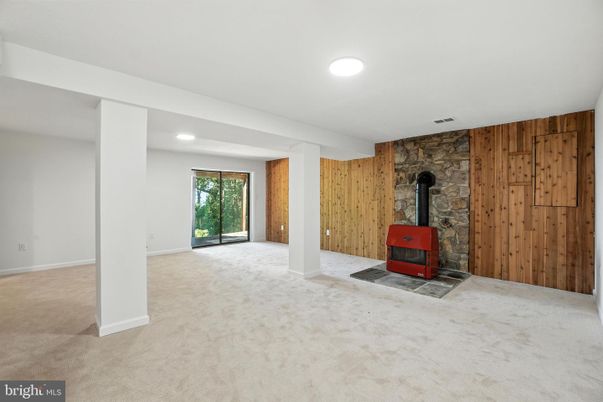 Empty room, Fireplace, Interior, Recessed Lighting, Stone Walls, Wooden Walls