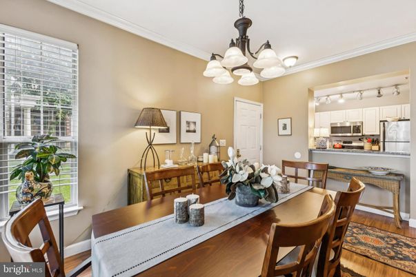 Chandelier, Dining room, Interior, Kitchen, Pendant Lights, Stainless Steel Appliances, Wood Texture Flooring