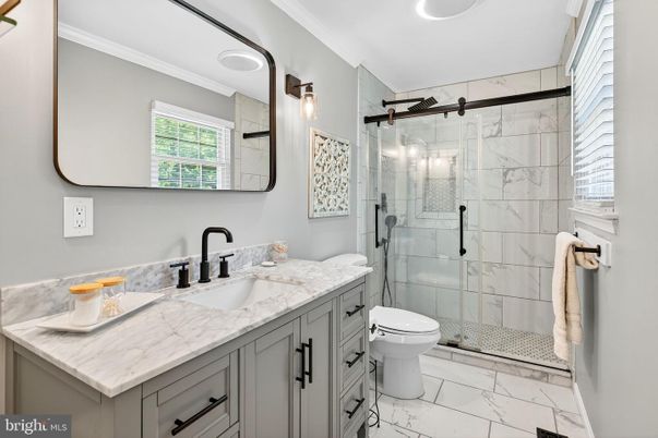 Bathroom, Dual Sink Vanities, Glass Shower, Interior, Marble, Marble Walls, Recessed Lighting
