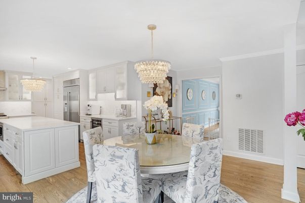 Chandelier, Dining room, Interior, Kitchen, Recessed Lighting, Stainless Steel Appliances, Wood Texture Flooring
