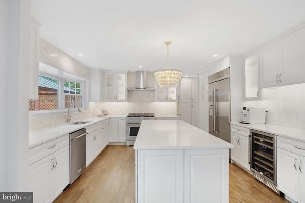 Chandelier, Interior, Kitchen, Recessed Lighting, Stainless Steel Appliances, Wood Texture Flooring