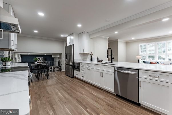 Dining room, Interior, Kitchen, Recessed Lighting, Stainless Steel Appliances, Wood Texture Flooring