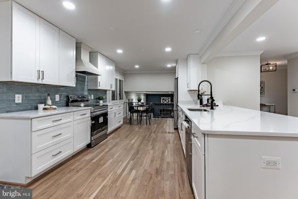 Dining room, Interior, Kitchen, Recessed Lighting, Stainless Steel Appliances, Wood Texture Flooring