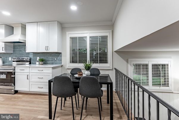 Dining room, Interior, Kitchen, Recessed Lighting, Stainless Steel Appliances, Wood Texture Flooring