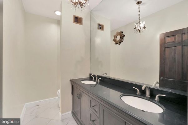 Bathroom, Chandelier, Dual Sink Vanities, Interior, Marble, Recessed Lighting