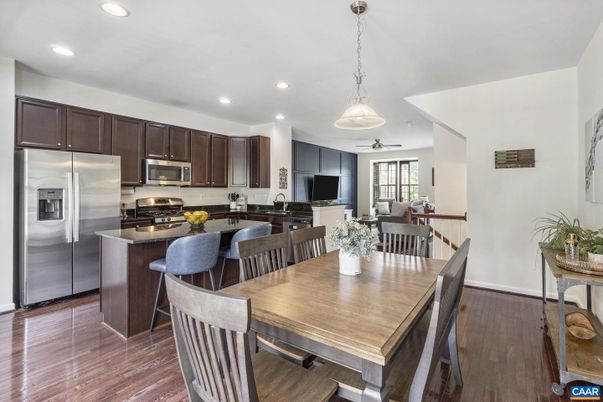 Dining room, Interior, Kitchen, Pendant Lights, Recessed Lighting, Stainless Steel Appliances, Wood Texture Flooring