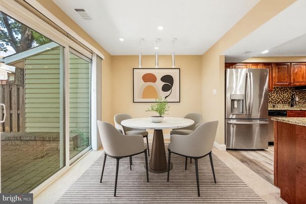 Dining room, Interior, Kitchen, Pendant Lights, Recessed Lighting, Stainless Steel Appliances, Wood Texture Flooring