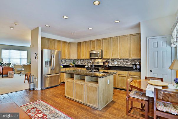 Dining room, Interior, Kitchen, Recessed Lighting, Stainless Steel Appliances, Wood Texture Flooring