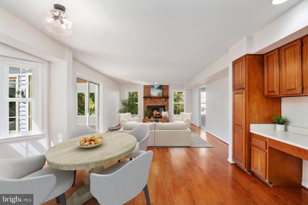 Dining room, Fireplace, Interior, Living room, Recessed Lighting, Wood Texture Flooring