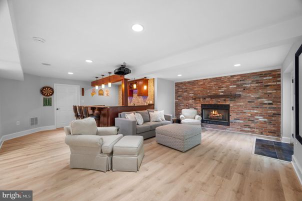 Fireplace, Interior, Living room, Pendant Lights, Recessed Lighting, Stone Walls, Wood Texture Flooring