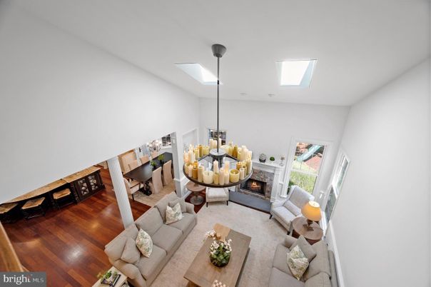 Dining room, Fireplace, Interior, Living room, Pendant Lights, Recessed Lighting, Wood Texture Flooring