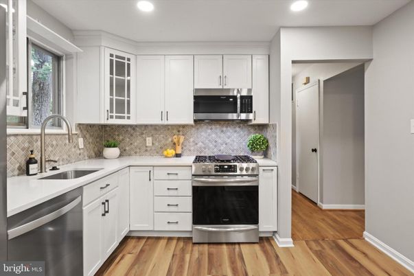Interior, Kitchen, Recessed Lighting, Stainless Steel Appliances, Wood Texture Flooring